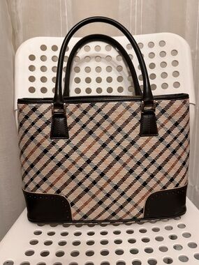 Daks London handbag in a tartan check pattern with leather trim and top handles